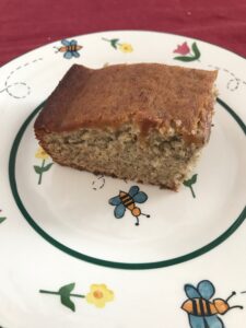 Piece of banana cake on pretty plate
